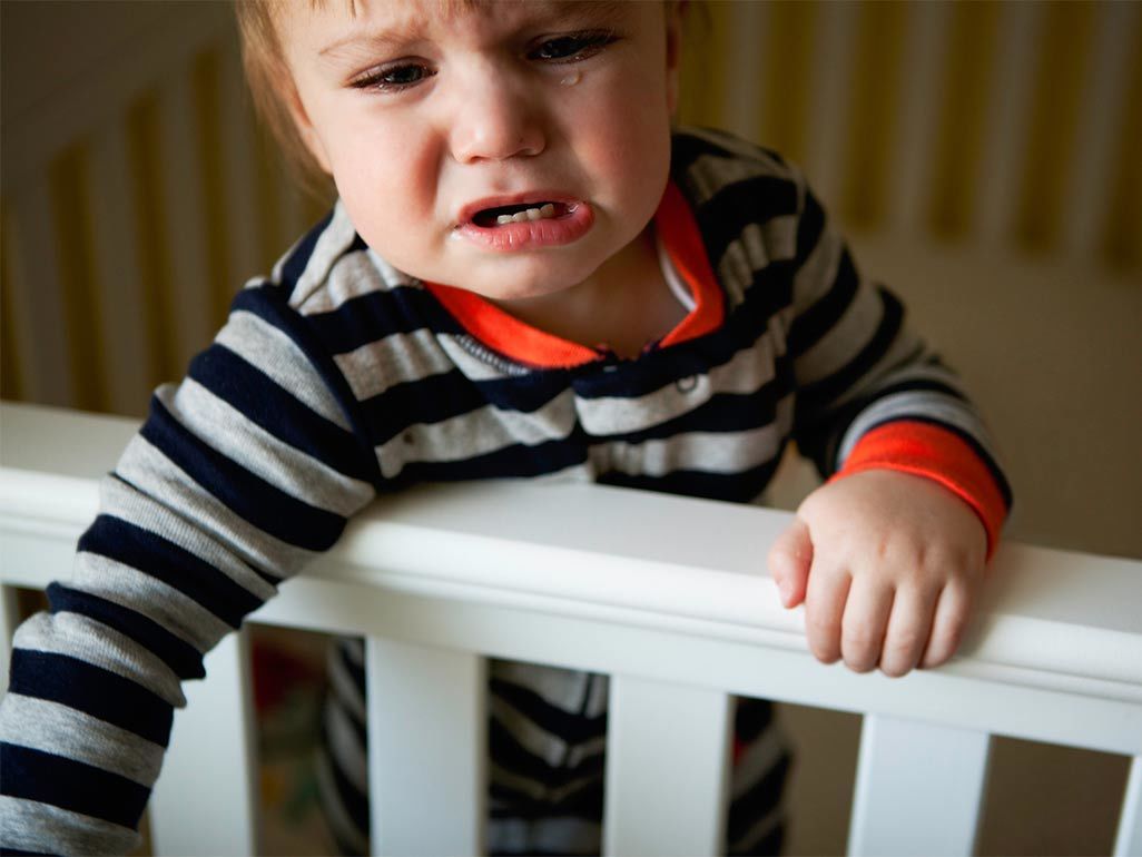 toddler crying in crib