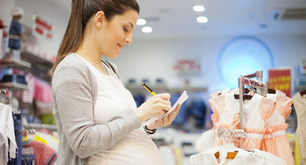 pregnant woman shopping from list