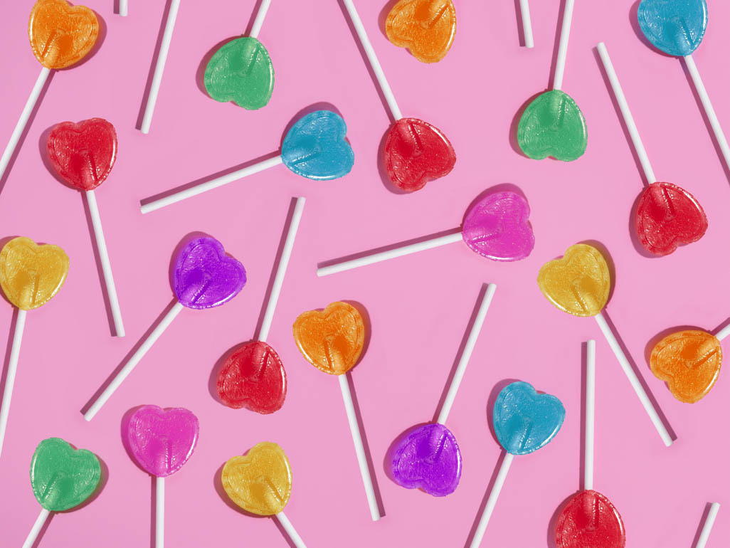 lollipops on pink background